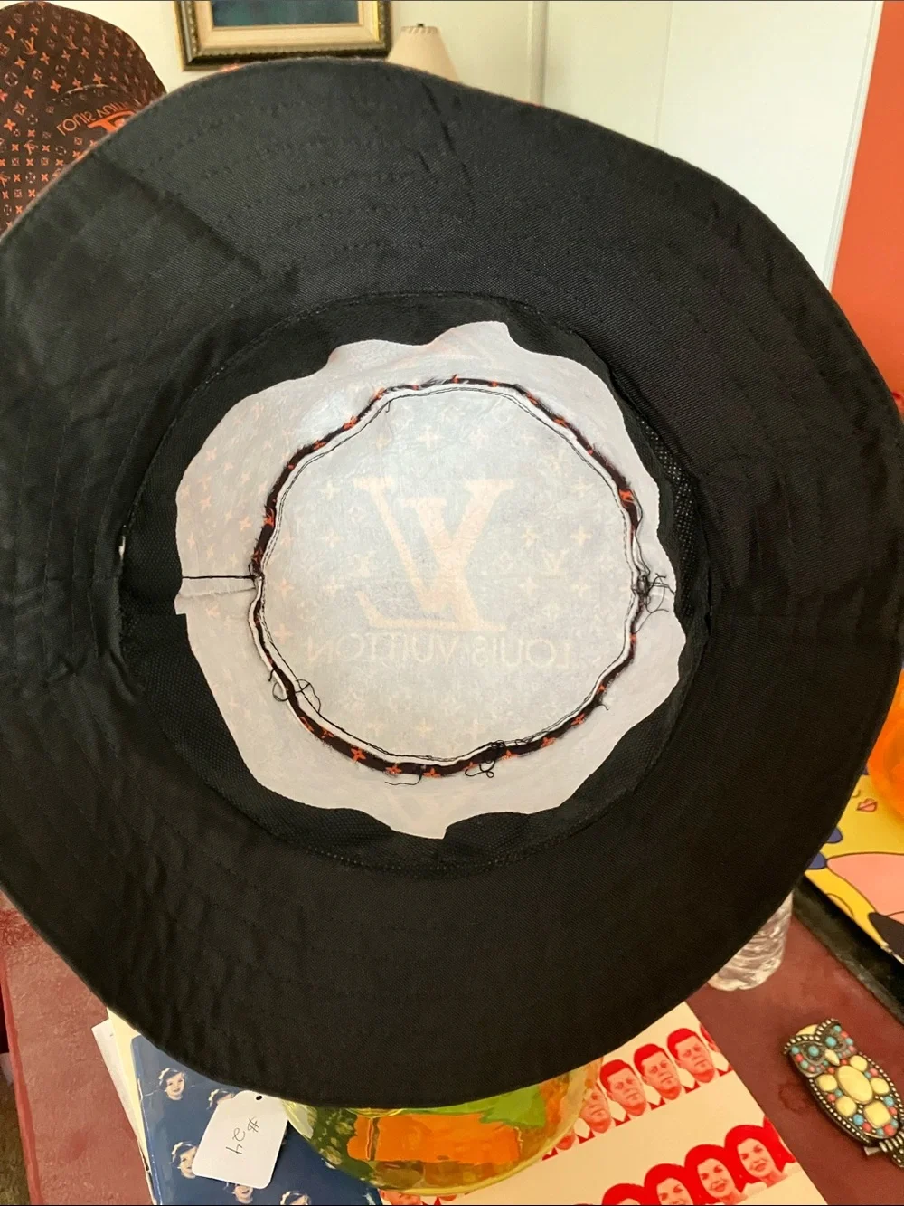 FauxLouis Vuitton Navy and Orange Monogram Bucket Hat.
